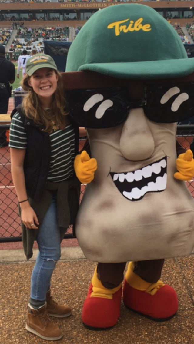 woman with sports mascot